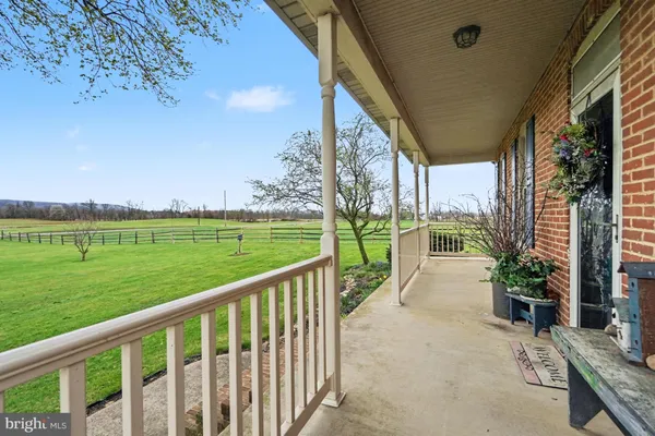 a view of a porch with a yard
