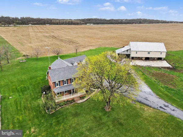 a aerial view of a house with a lake view