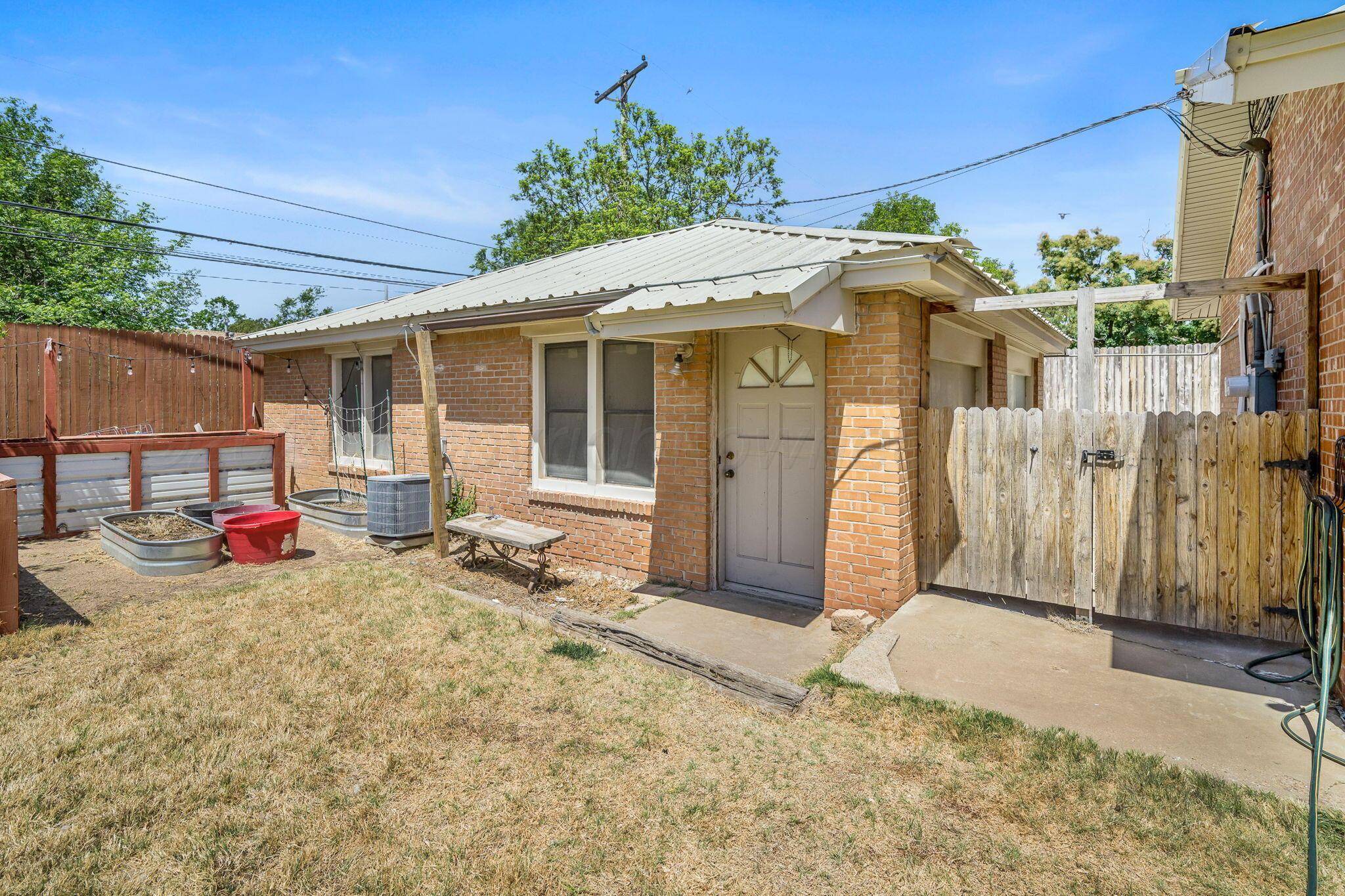 1018 South Bryan Street Amarillo, TX 79102 - Photo 22 of 41 a view of a house with a patio
