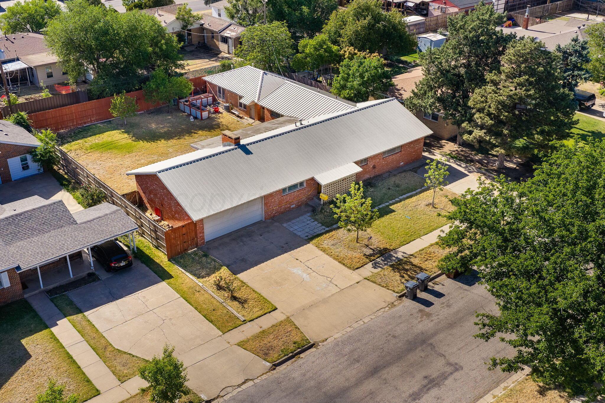 1018 South Bryan Street Amarillo, TX 79102 - Photo 39 of 41 an aerial view of a house with pool table and chairs