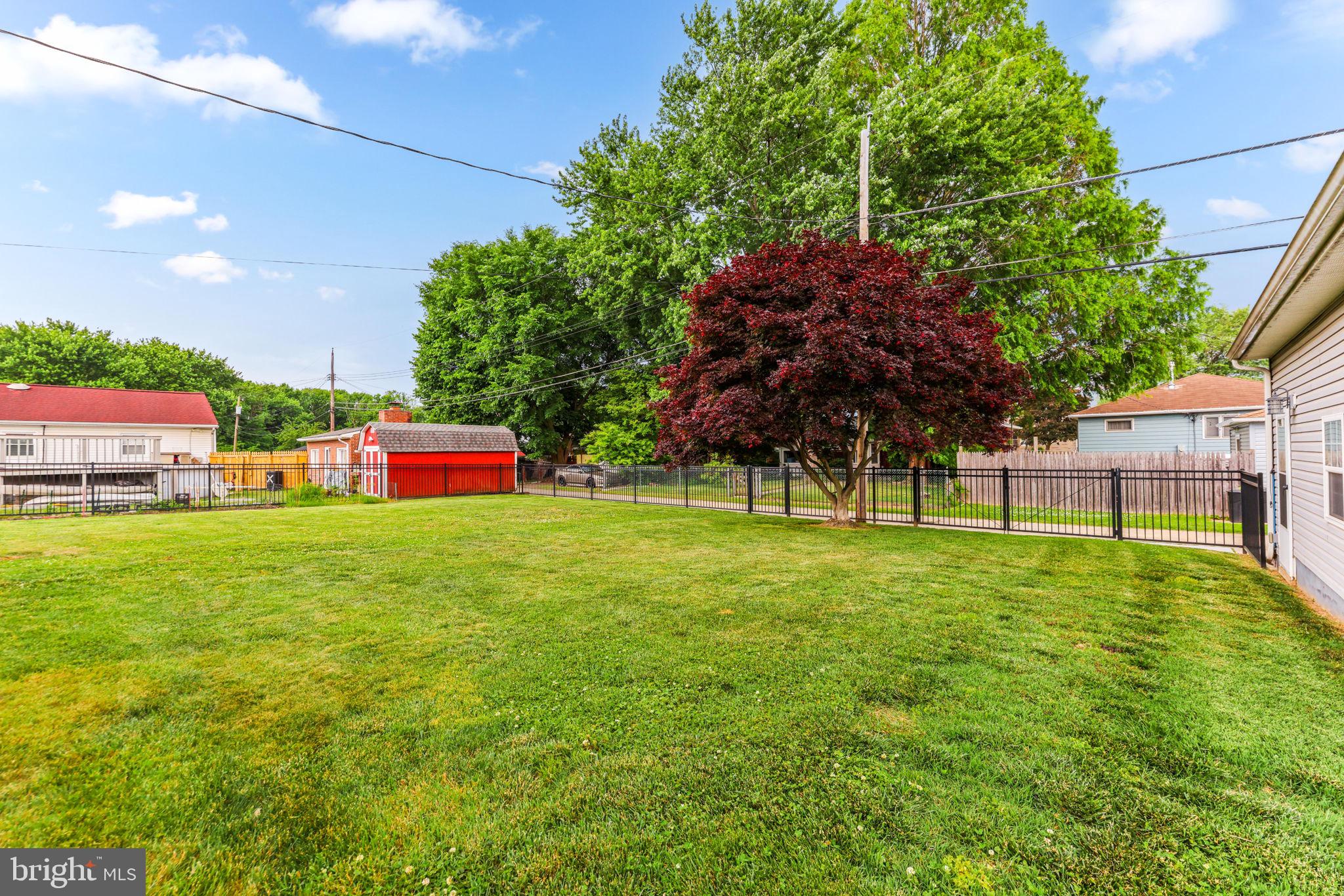 2902 Ritchie Avenue Baltimore, MD 21219 - Photo 41 of 43 a yard with lots of green space