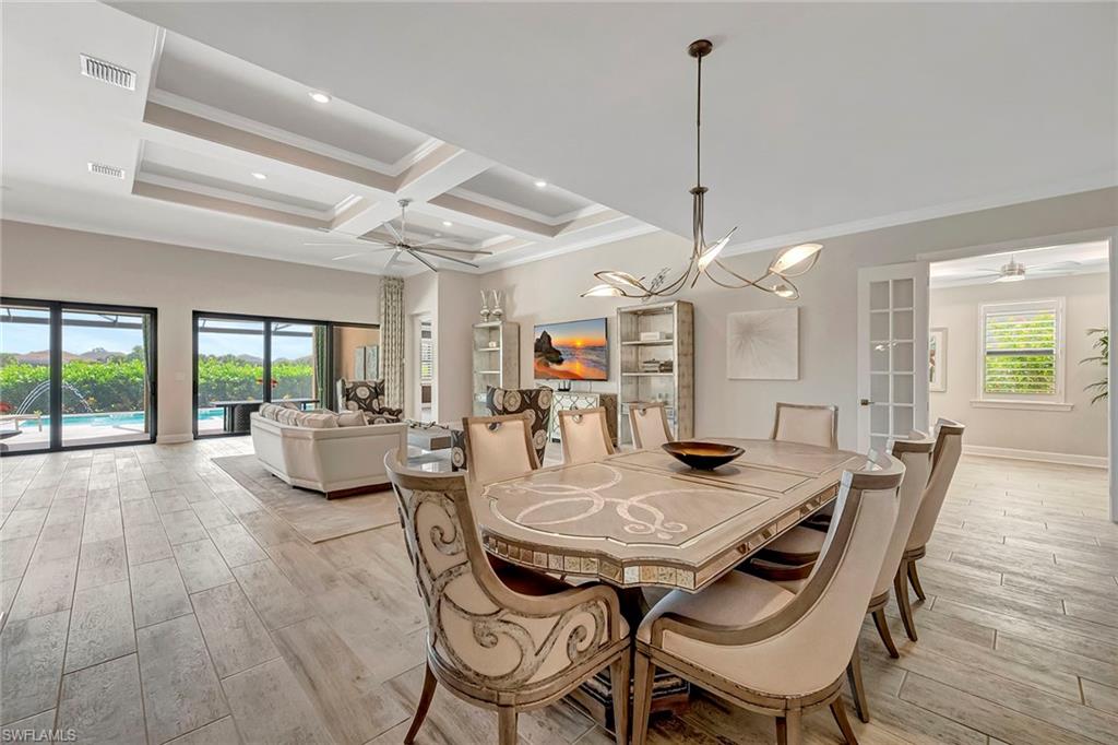9574 Everglades Boulevard North Naples, FL 34120 - Photo 11 of 45 Dining Area with French Glass Doors to Den