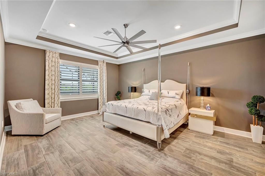 9574 Everglades Boulevard North Naples, FL 34120 - Photo 13 of 45 Primary Bedroom with King Bed