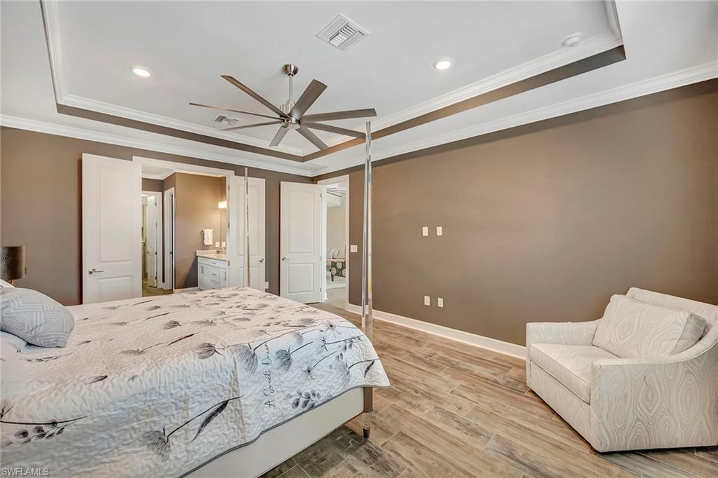 9574 Everglades Boulevard North Naples, FL 34120 - Photo 14 of 45 Primary Bedroom