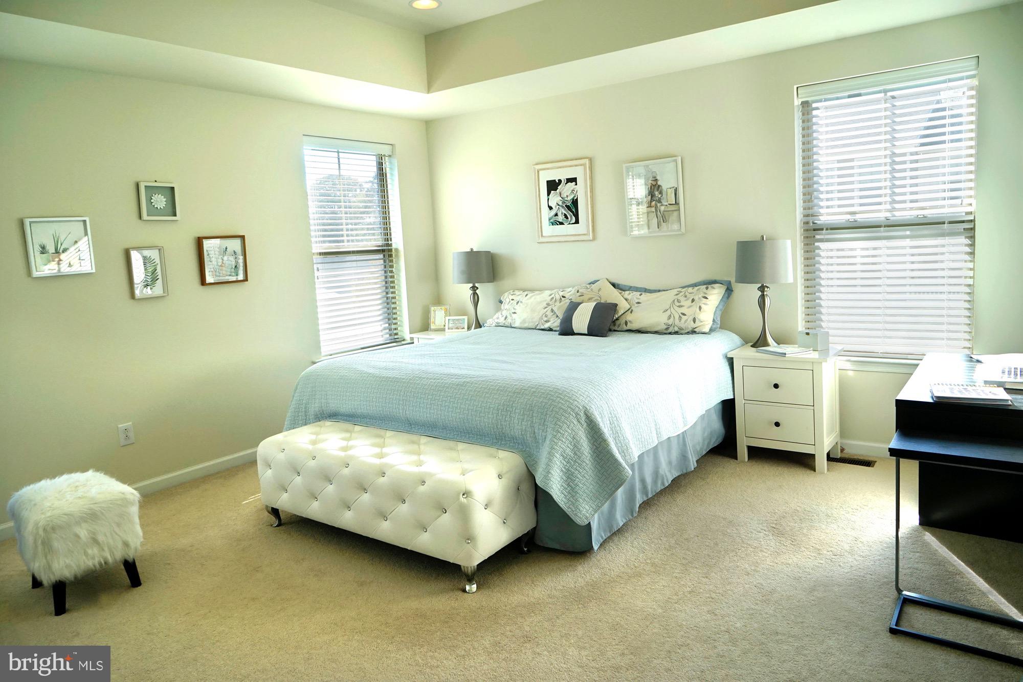 29 Chasmere Drive Kennett Square, PA 19348 - Photo 12 of 21 a bedroom with a bed and a couch