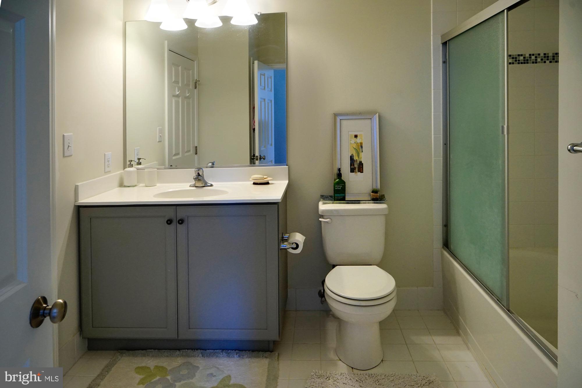 29 Chasmere Drive Kennett Square, PA 19348 - Photo 17 of 21 a bathroom with a toilet a sink and mirror