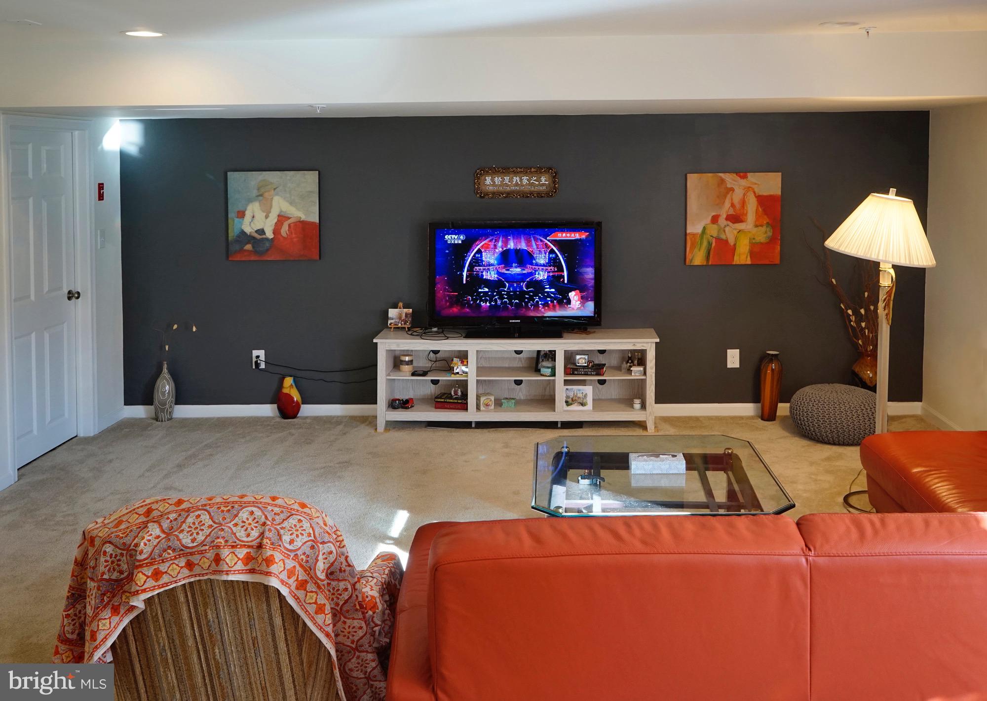 29 Chasmere Drive Kennett Square, PA 19348 - Photo 18 of 21 a living room with furniture and a flat screen tv