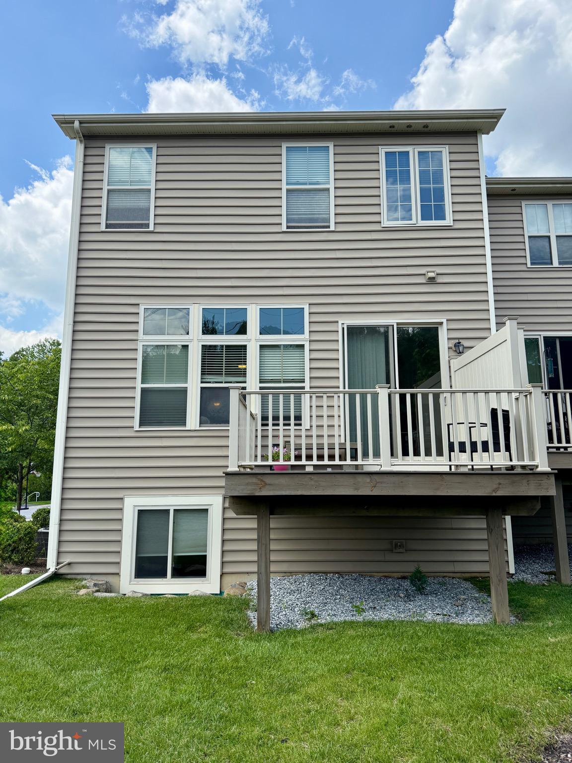 29 Chasmere Drive Kennett Square, PA 19348 - Photo 5 of 21 a view of a house with backyard and deck