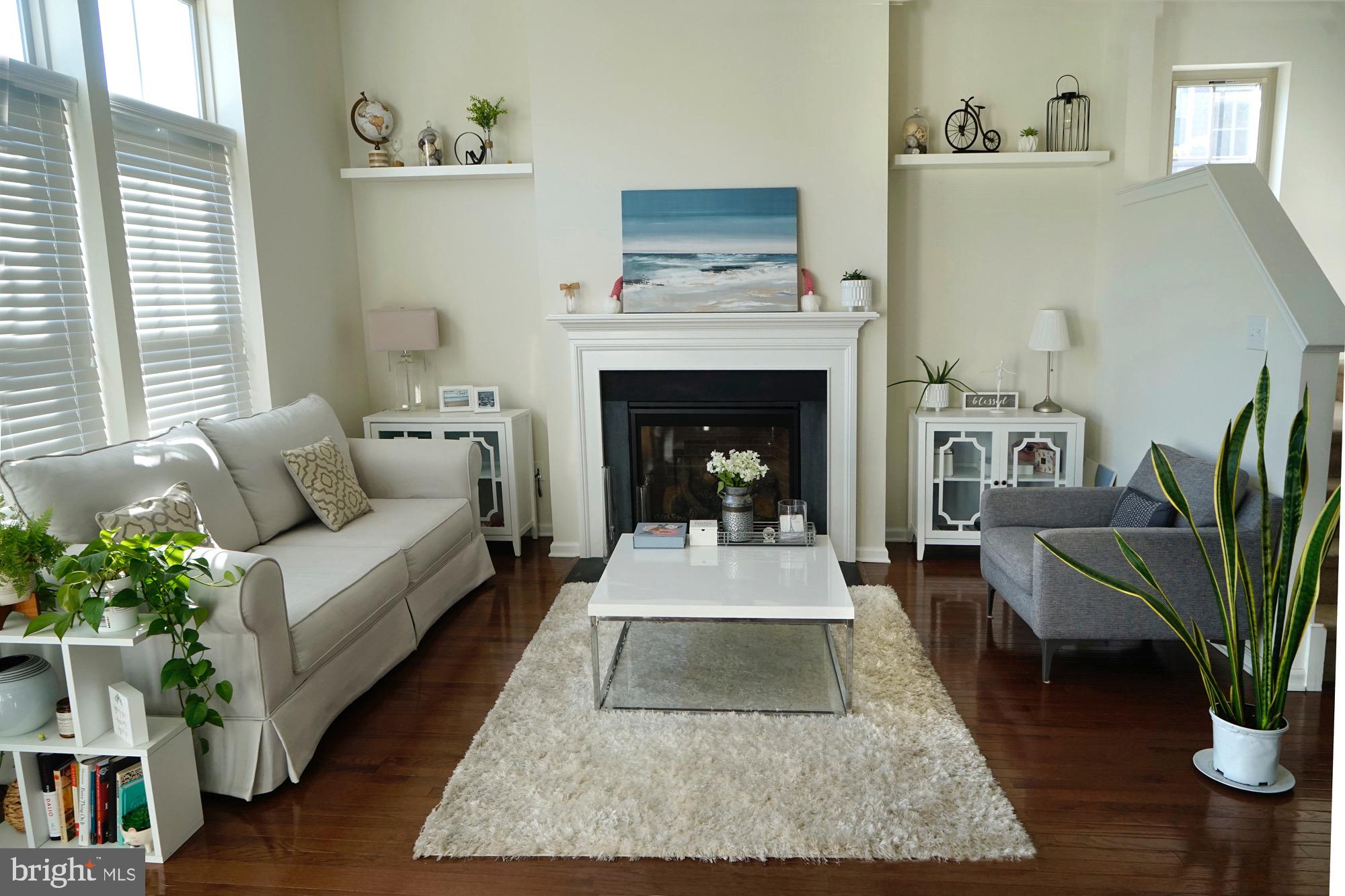 29 Chasmere Drive Kennett Square, PA 19348 - Photo 10 of 21 a living room with furniture and a fireplace