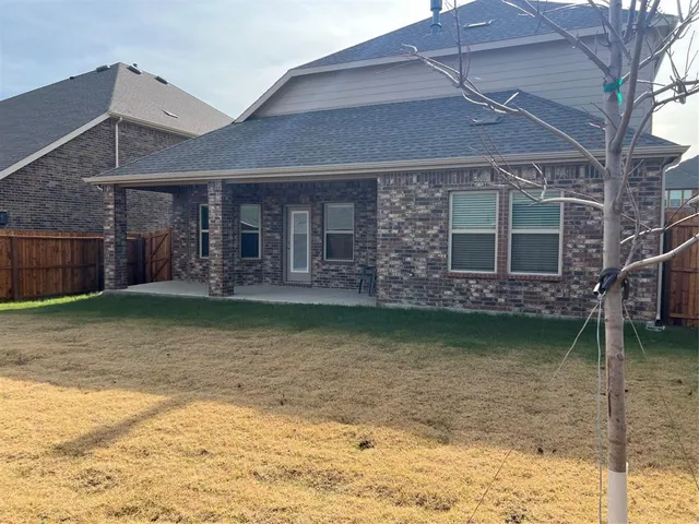 a view of swimming pool with outdoor seating
