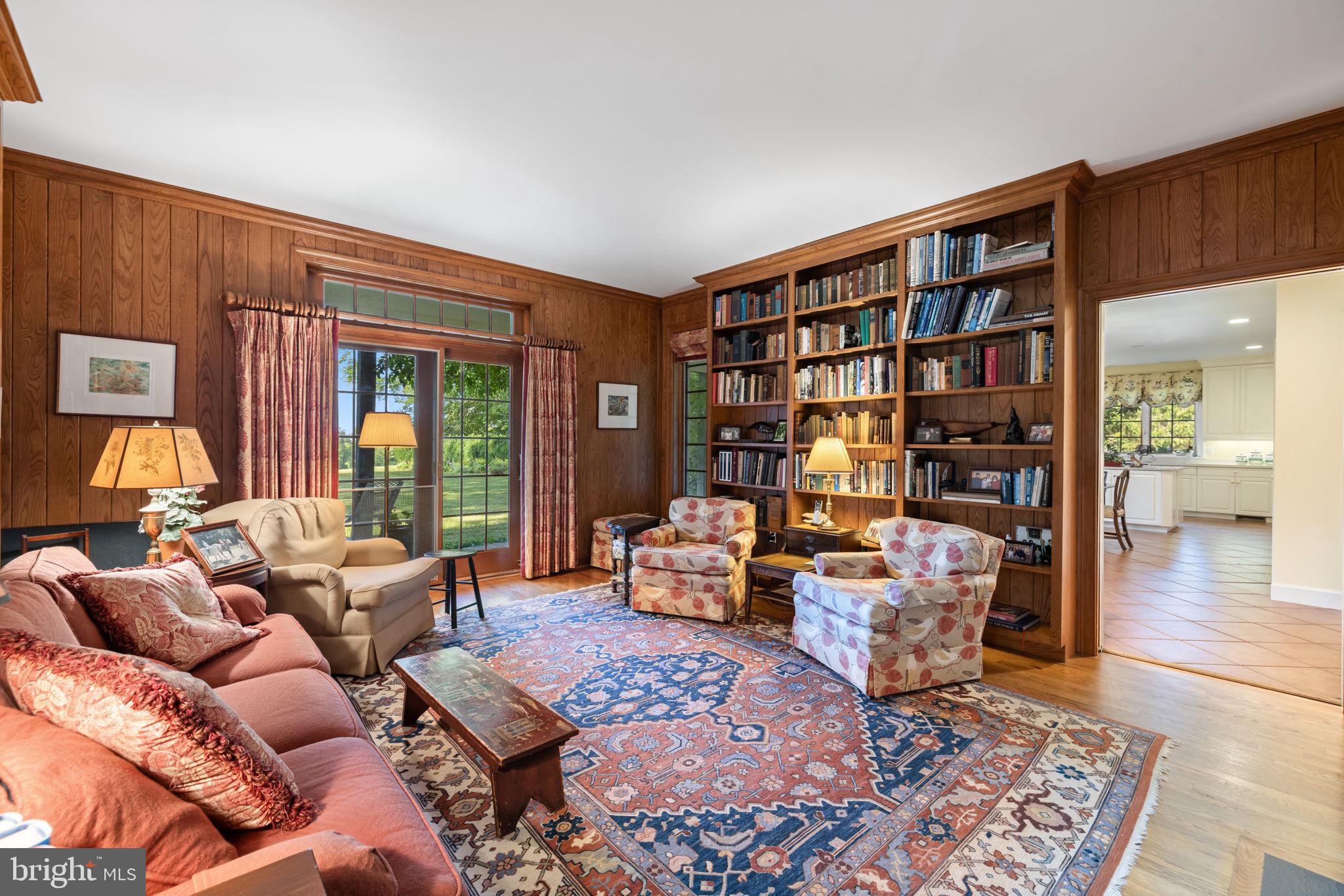 3418 Halfway Road The Plains, VA 20198 - Photo 13 of 106 a living room with furniture and a book shelf