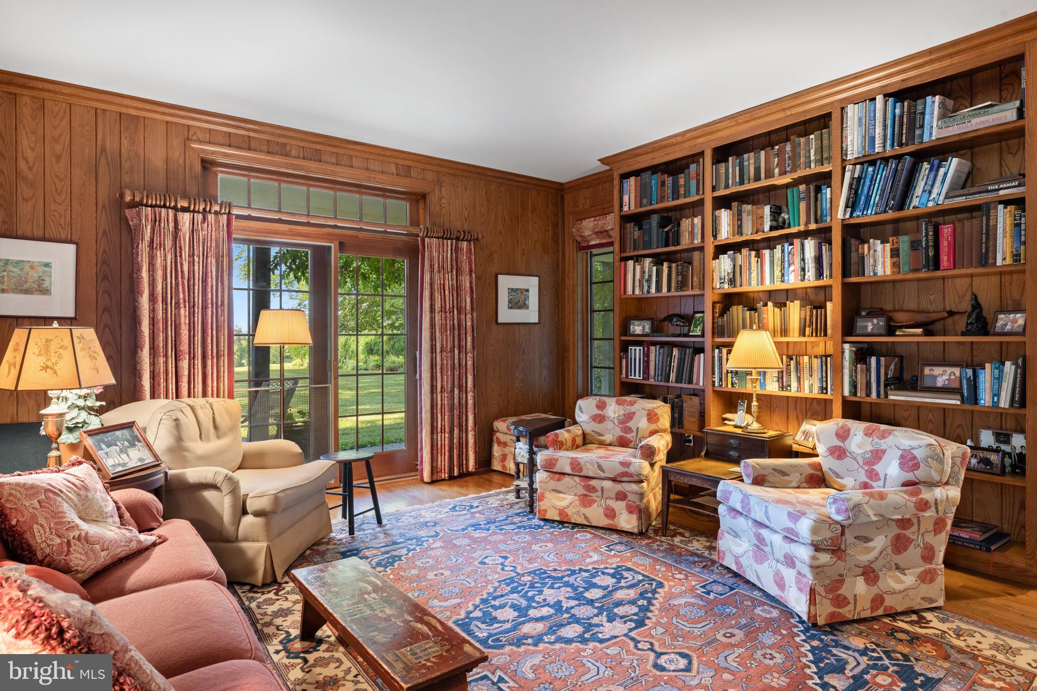 3418 Halfway Road The Plains, VA 20198 - Photo 14 of 106 a living room with furniture and a book shelf
