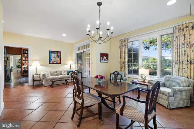 a bedroom with bed and a window