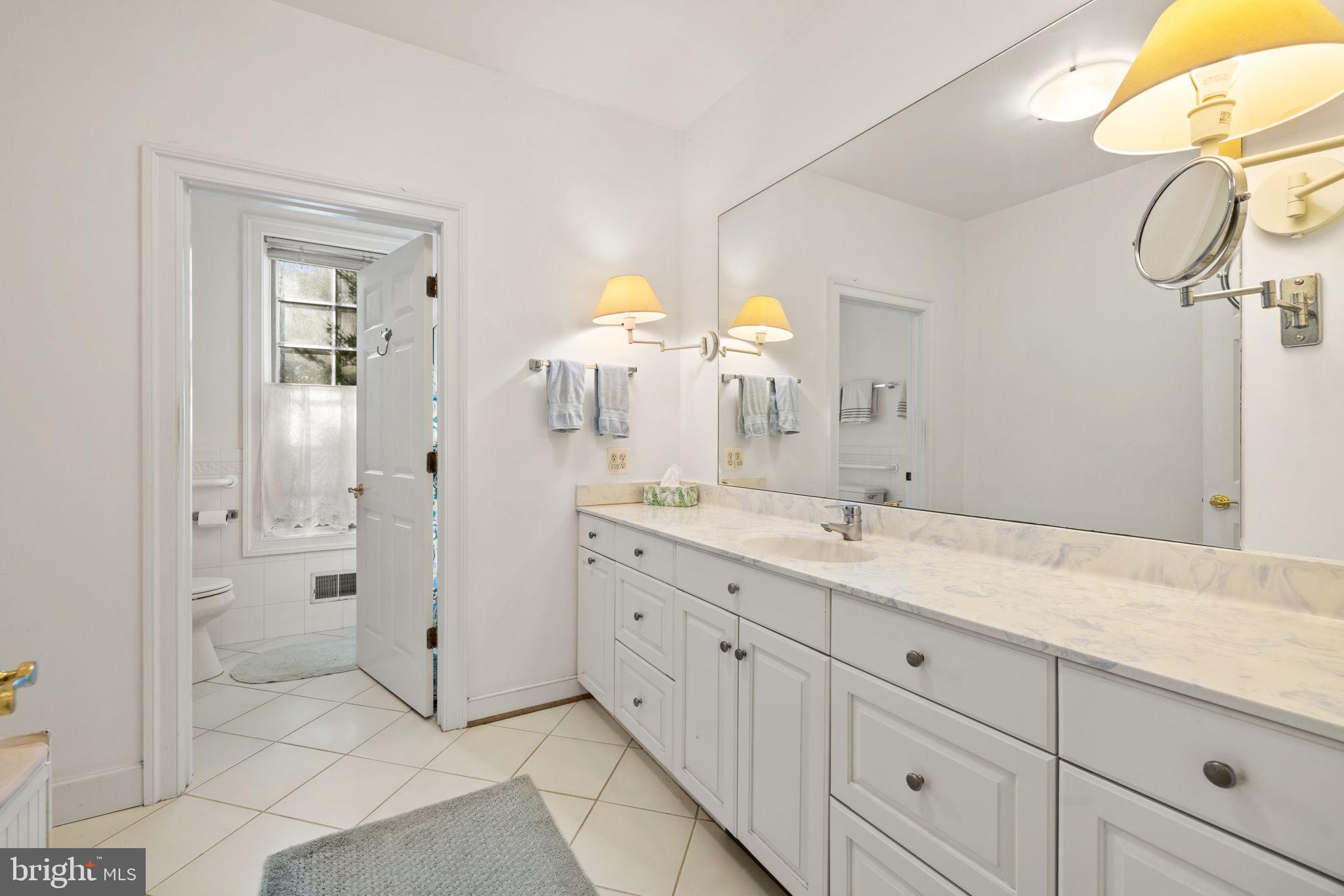 3418 Halfway Road The Plains, VA 20198 - Photo 30 of 106 a bathroom with a granite countertop sink mirror and