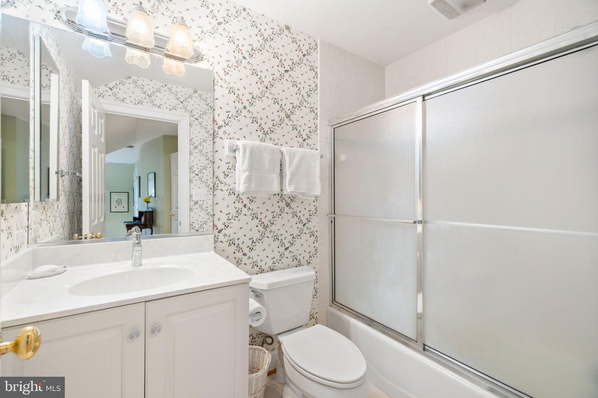 3418 Halfway Road The Plains, VA 20198 - Photo 37 of 106 a bathroom with a sink a toilet and shower