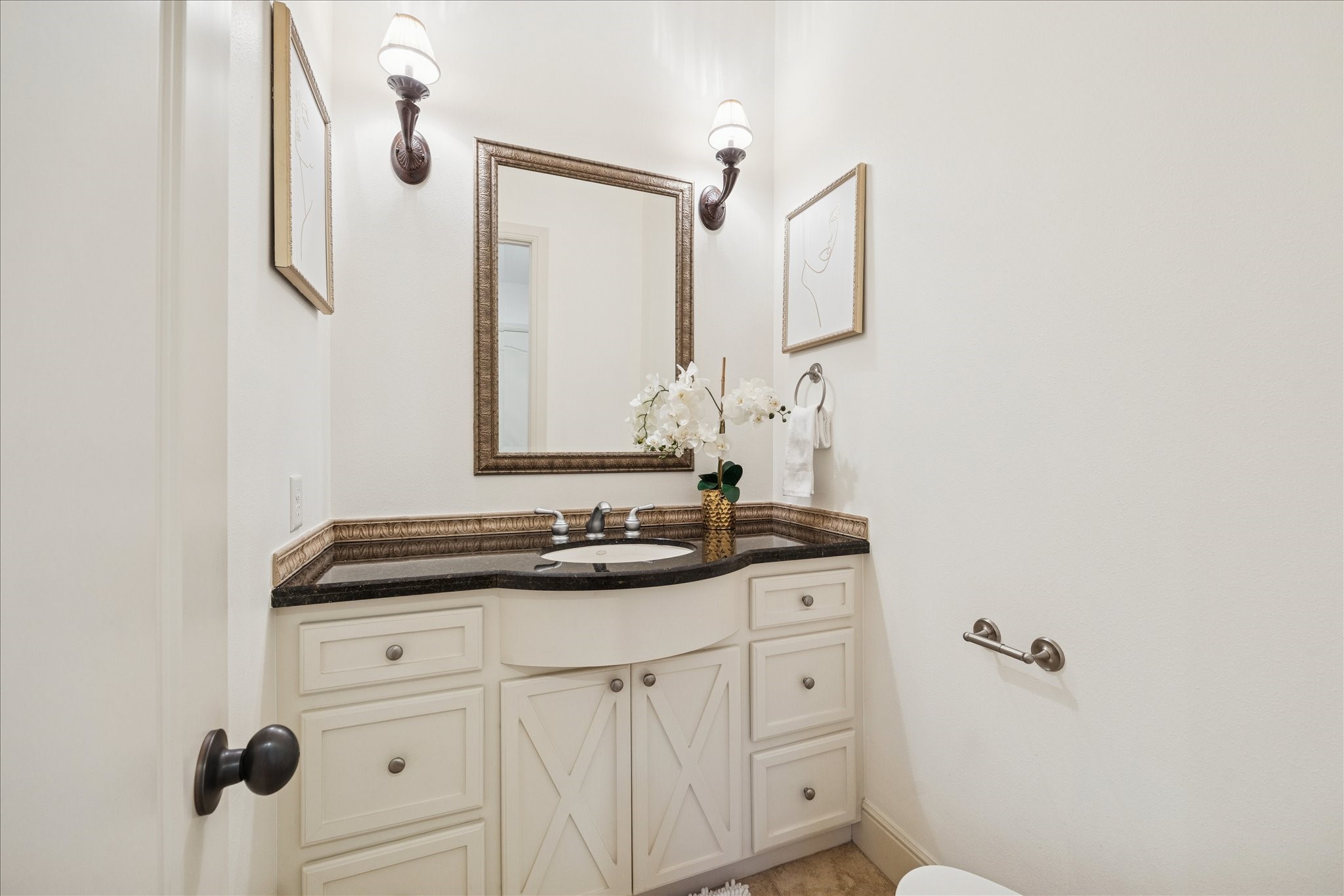 4226 Law Street, Unit B Houston, TX 77005 - Photo 19 of 32 a bathroom with a granite countertop sink and a mirror