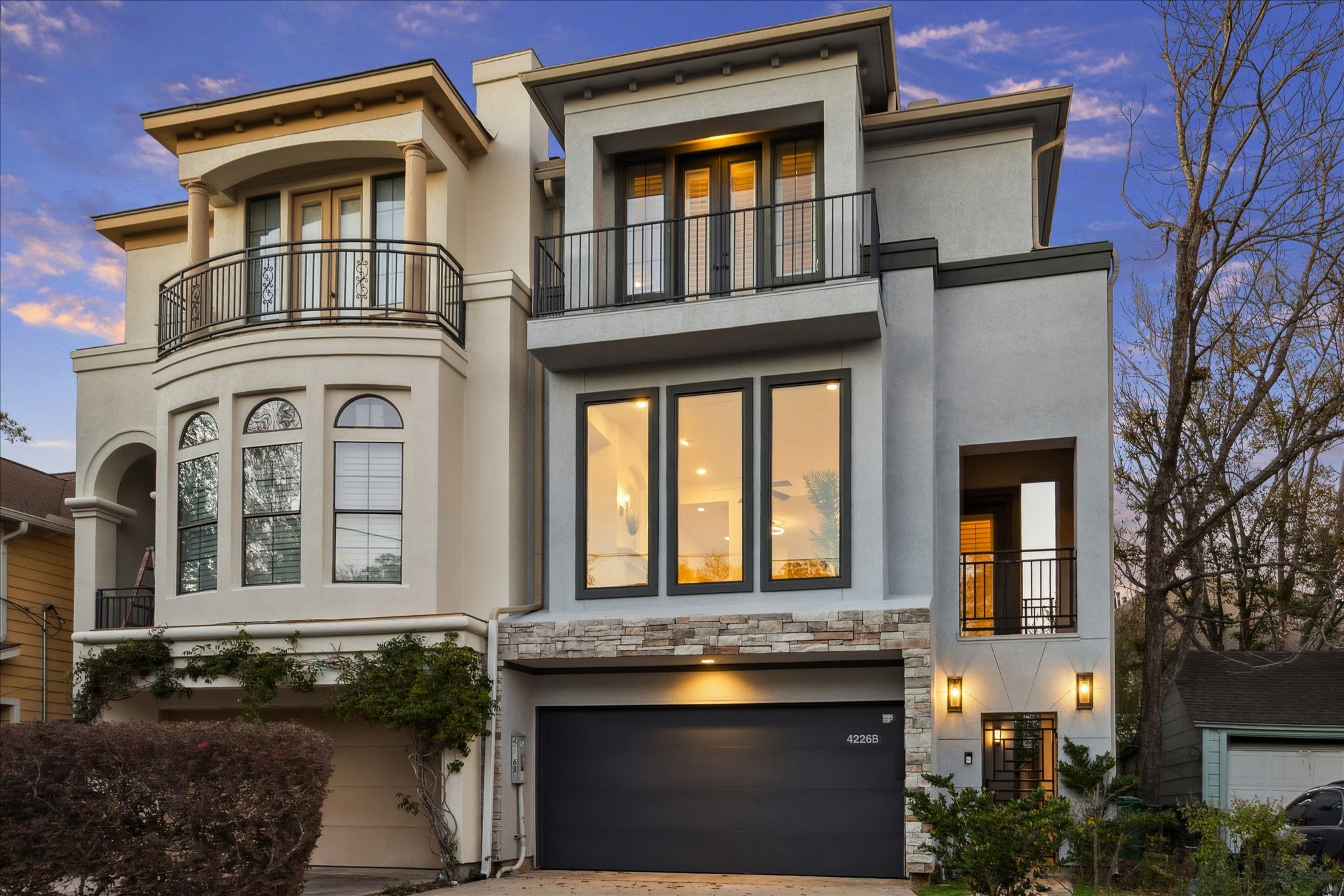 4226 Law Street, Unit B Houston, TX 77005 - Photo 2 of 32 a front view of a house with a yard