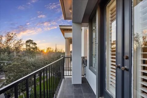 a spacious bathroom with a bathtub shower sink double and mirror