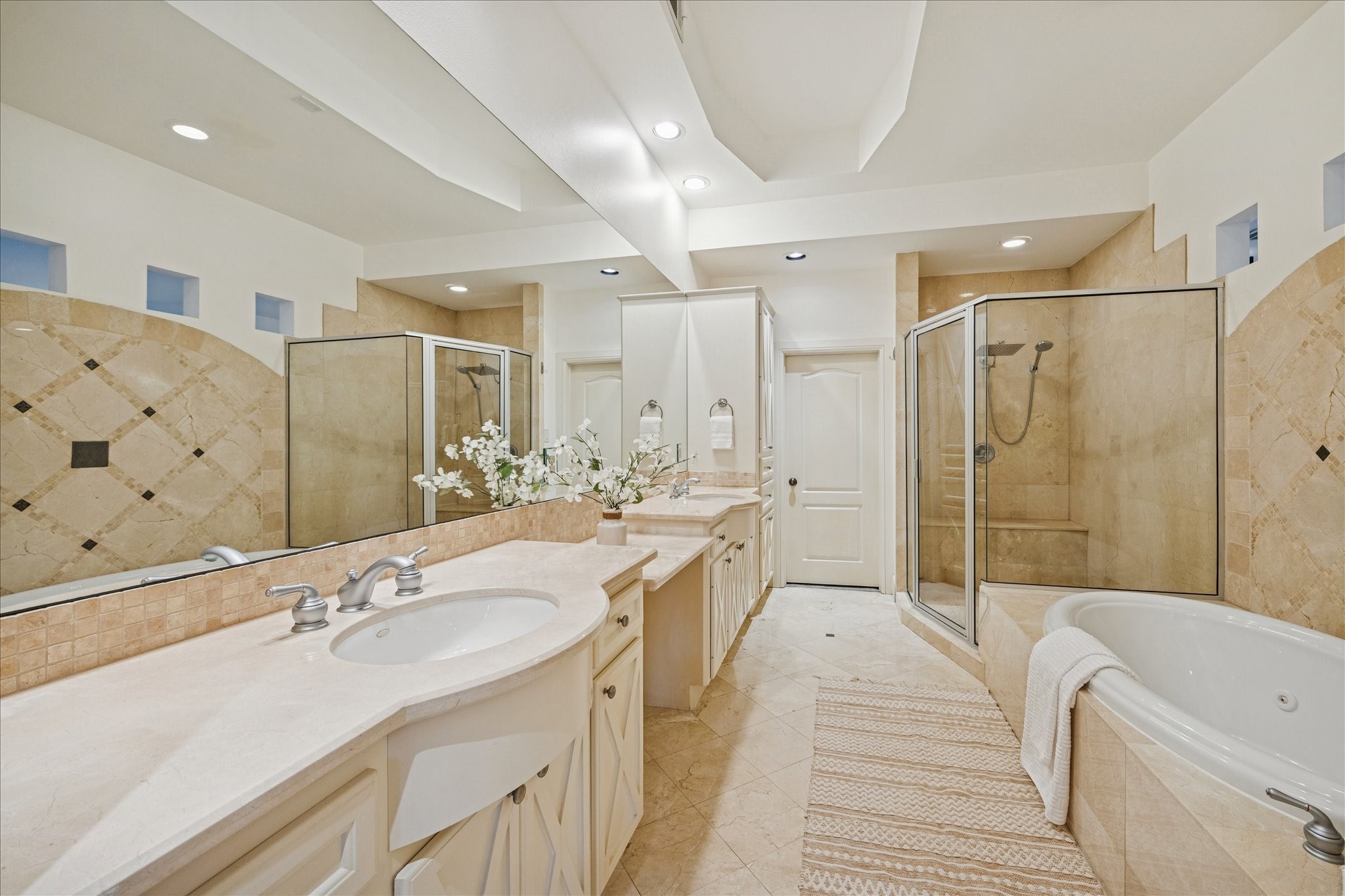 4226 Law Street, Unit B Houston, TX 77005 - Photo 23 of 32 a spacious bathroom with a bathtub shower sink double and mirror