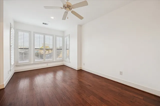 a utility room with dryer washer and a view of living room