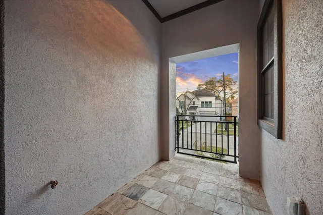 an aerial view of a large white building