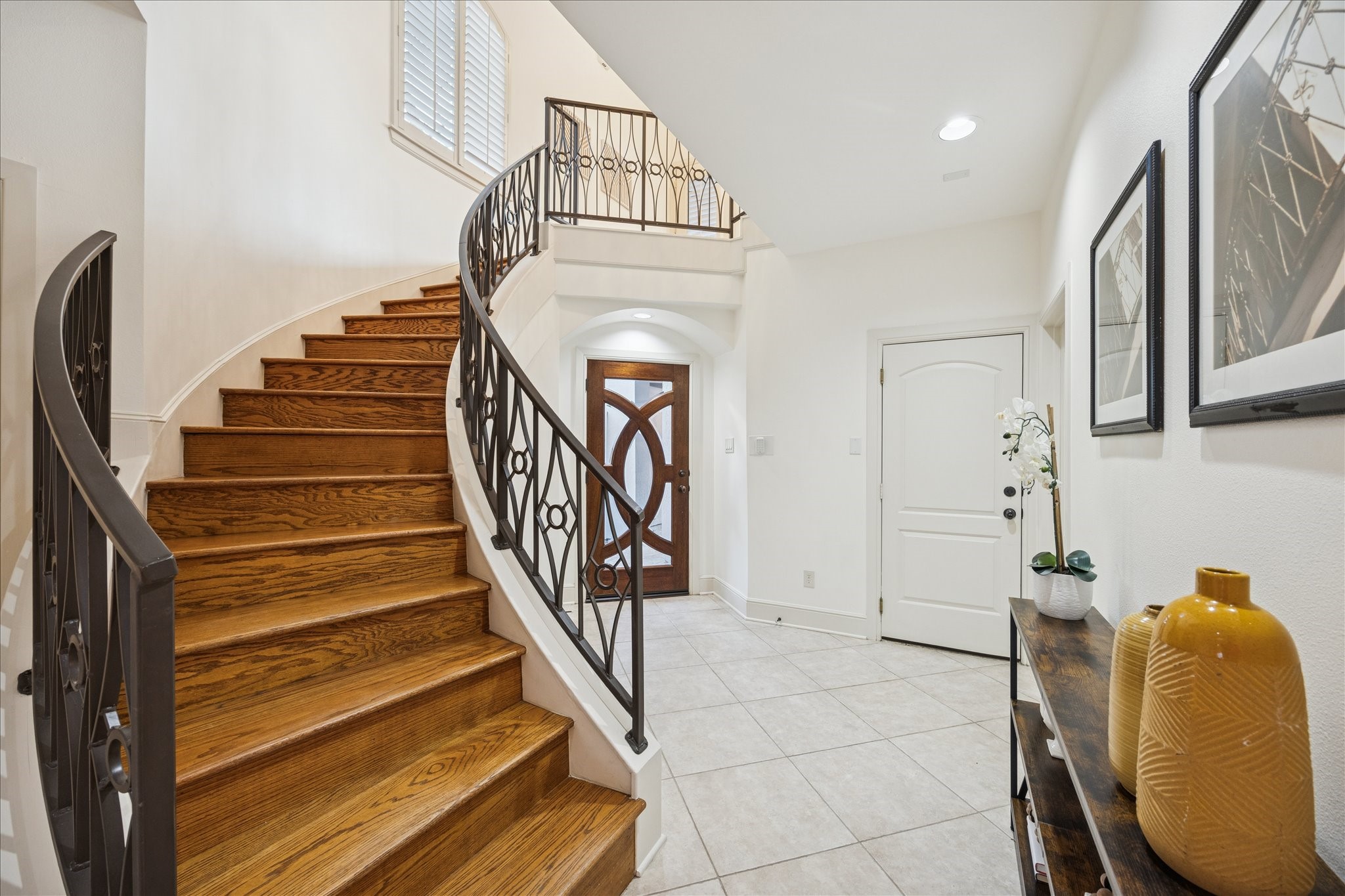 4226 Law Street, Unit B Houston, TX 77005 - Photo 4 of 32 a view of entryway and hall with wooden floor