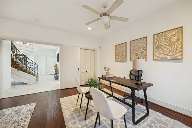 a view of a livingroom with furniture and wooden floor