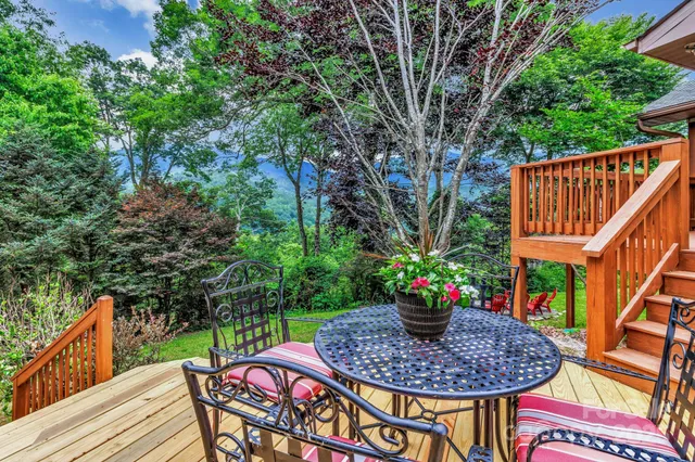 a view of a chairs and table in the terrace