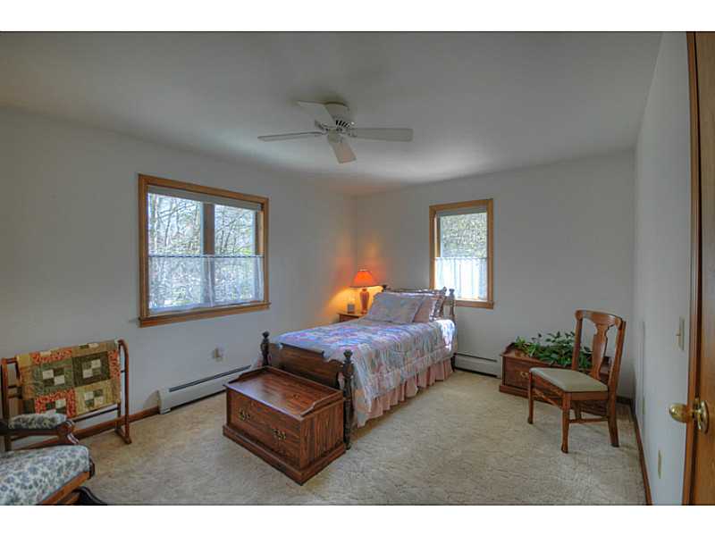 27 Kickapoo Run Charlestown, RI 02813 - Photo 12 of 20 Bedroom. The two bedrooms on the first level have access to a full bath with large walk in shower. Great accommodations for guests or family members. Bedrooms and bath on this level offer the flexibility of one level living.
