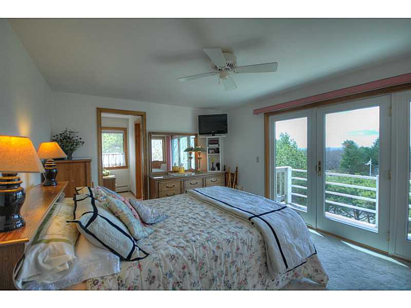 27 Kickapoo Run Charlestown, RI 02813 - Photo 8 of 20 Master Bedroom. The master bedroom and bath are the only rooms on the upper level offering ultimate privacy.