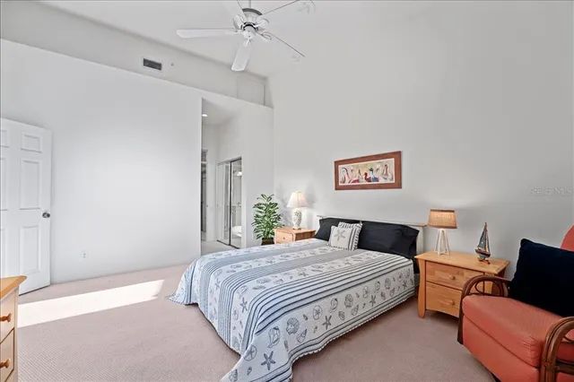 a hallway with furniture and a couch