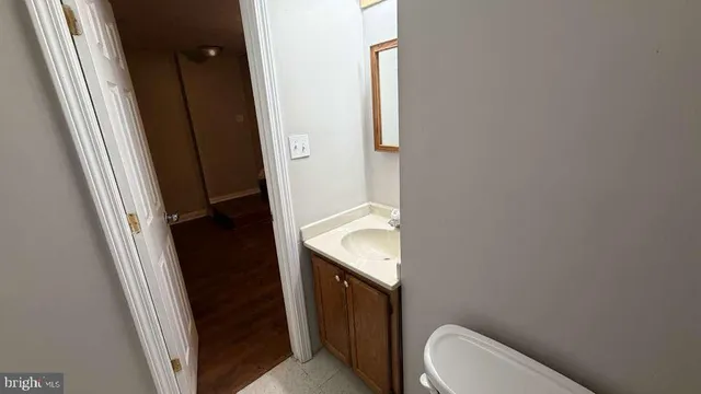 a bathroom with a sink and toilet