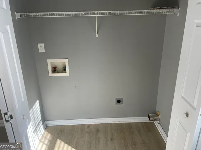 a view of a room with racks on the wall