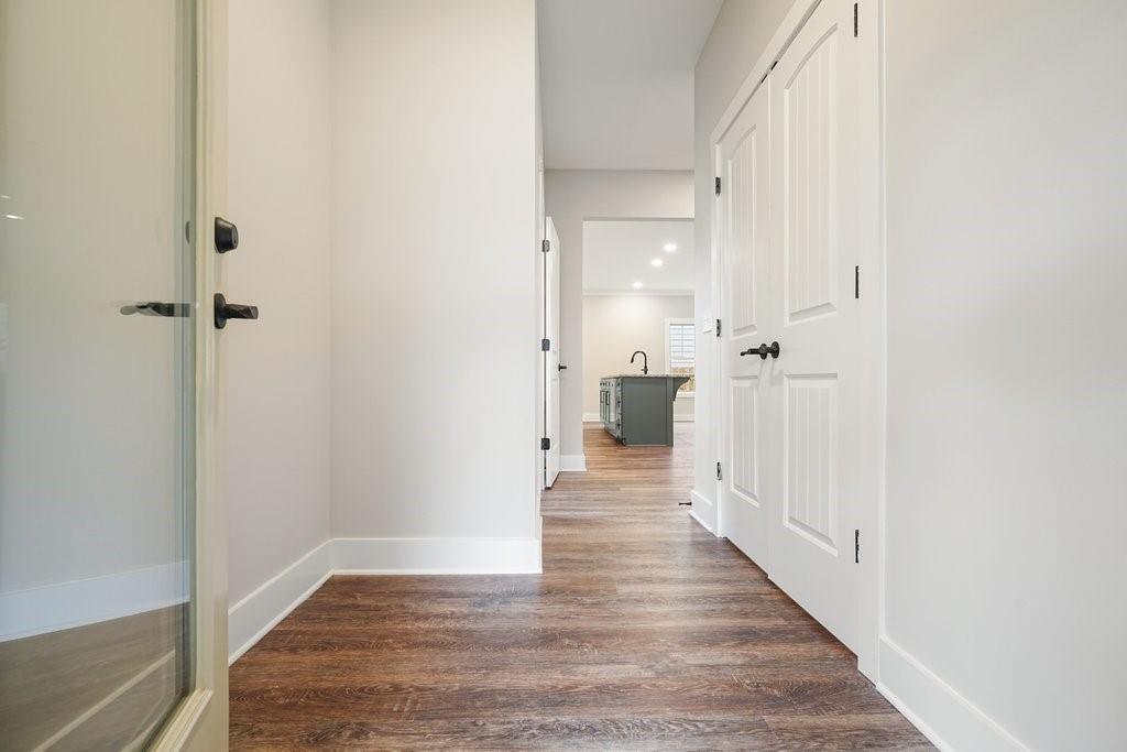 4749 Fowler Street Acworth, GA 30101 - Photo 16 of 60 a view of a hallway with wooden floor