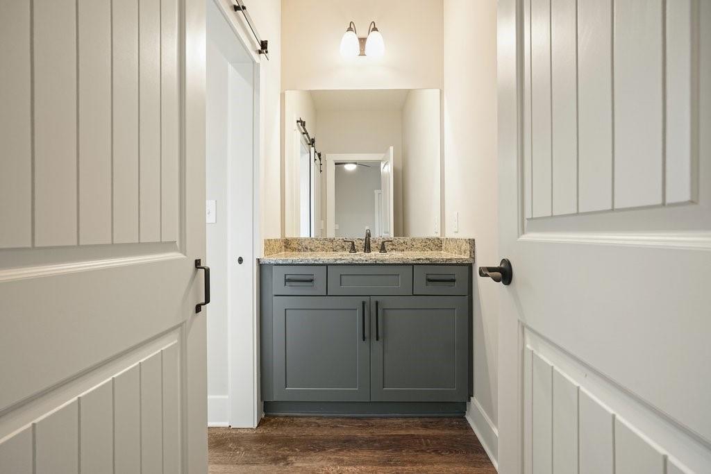 4749 Fowler Street Acworth, GA 30101 - Photo 32 of 60 a bathroom with a sink and a mirror