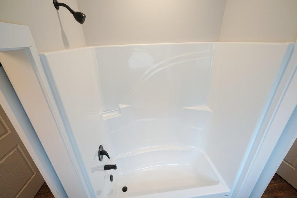 4749 Fowler Street Acworth, GA 30101 - Photo 33 of 60 a bathroom with a bathtub
