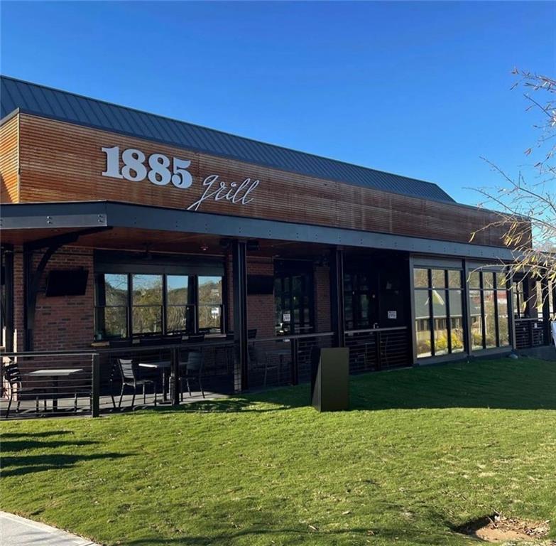 4749 Fowler Street Acworth, GA 30101 - Photo 48 of 60 a view of a swimming pool with an outdoor seating