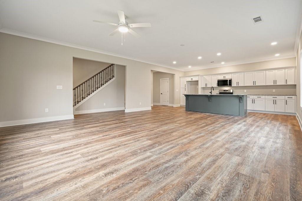 4749 Fowler Street Acworth, GA 30101 - Photo 5 of 60 a view of kitchen and kitchen with wooden floor