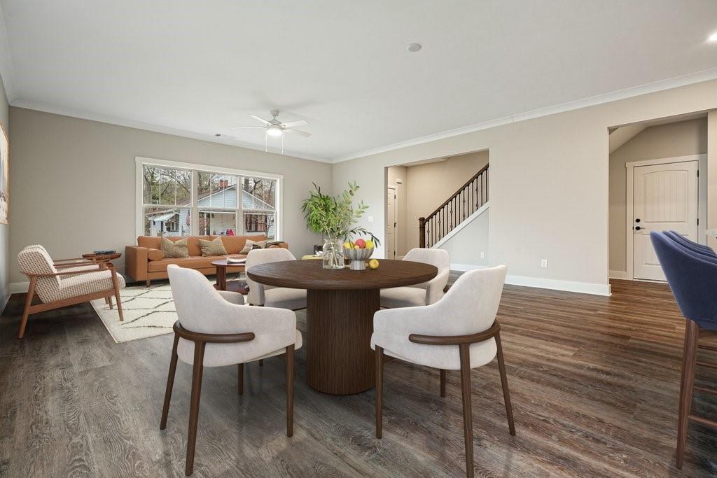 4749 Fowler Street Acworth, GA 30101 - Photo 56 of 60 a living room with furniture a rug potted plant and a window