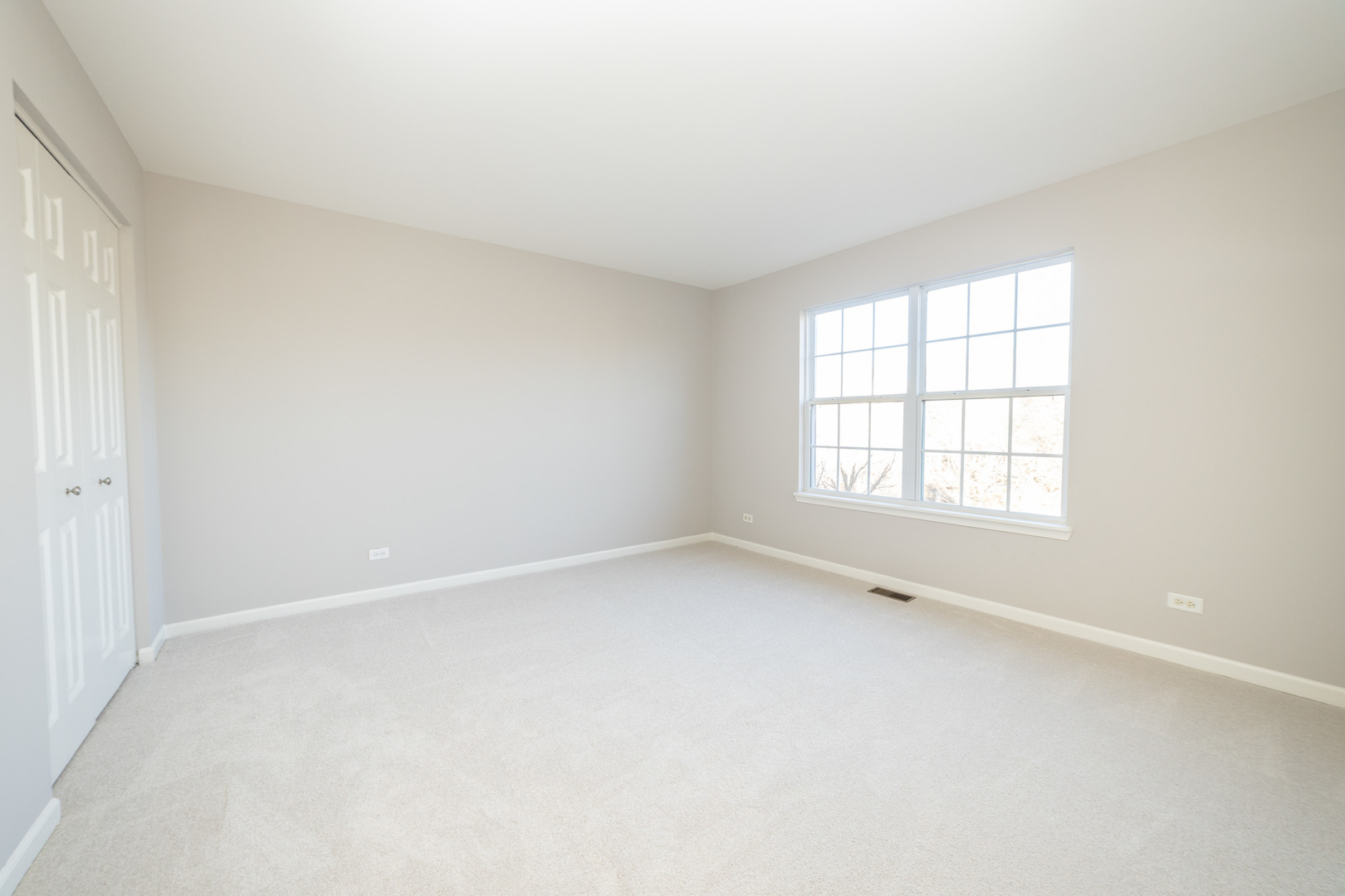 4313 Timber Ridge Court Joliet, IL 60431 - Photo 13 of 25 an empty room with a window