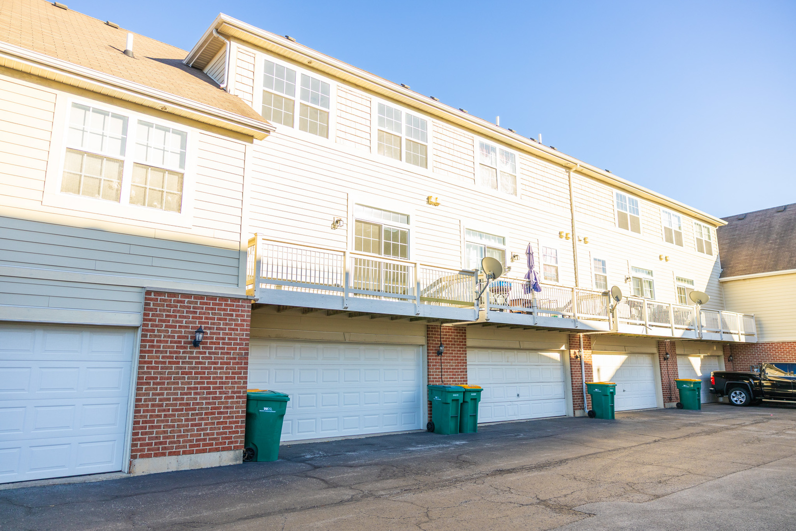 4313 Timber Ridge Court Joliet, IL 60431 - Photo 19 of 25 a front view of a building with many windows