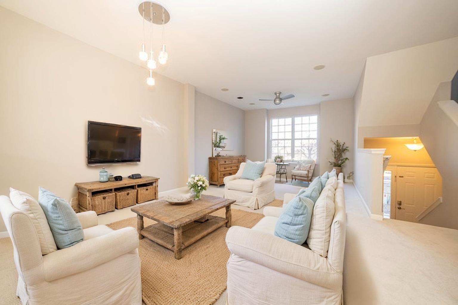 4313 Timber Ridge Court Joliet, IL 60431 - Photo 4 of 25 a living room with furniture and a flat screen tv