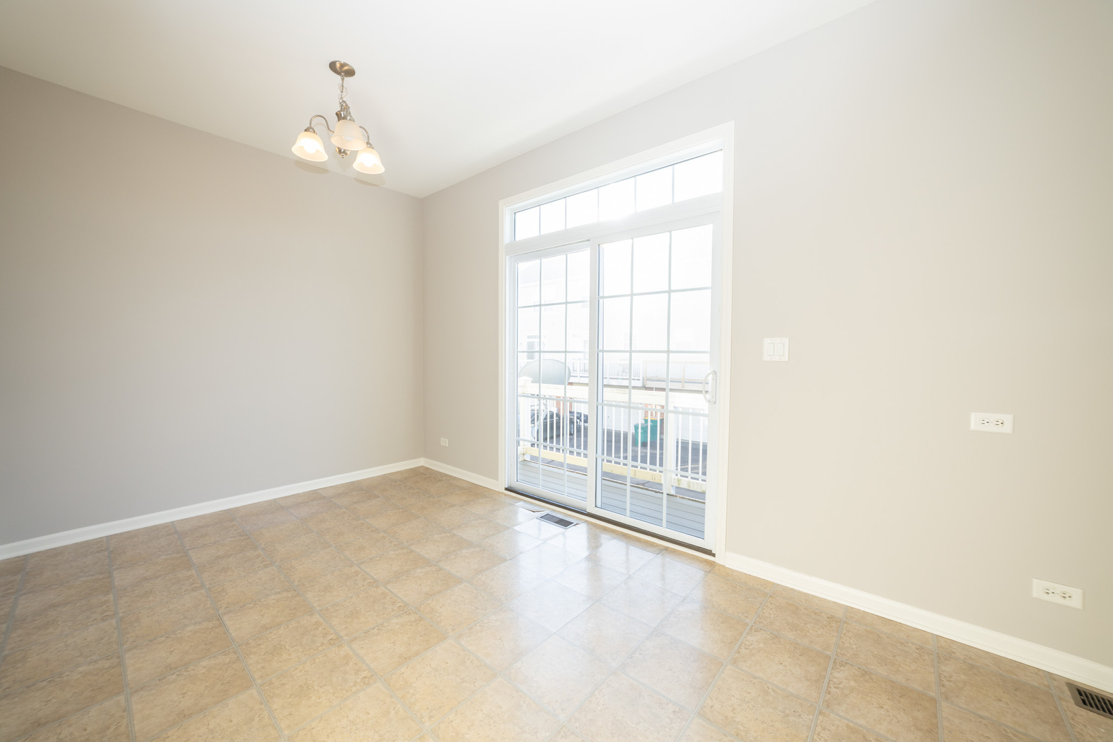 4313 Timber Ridge Court Joliet, IL 60431 - Photo 6 of 25 an empty room with windows
