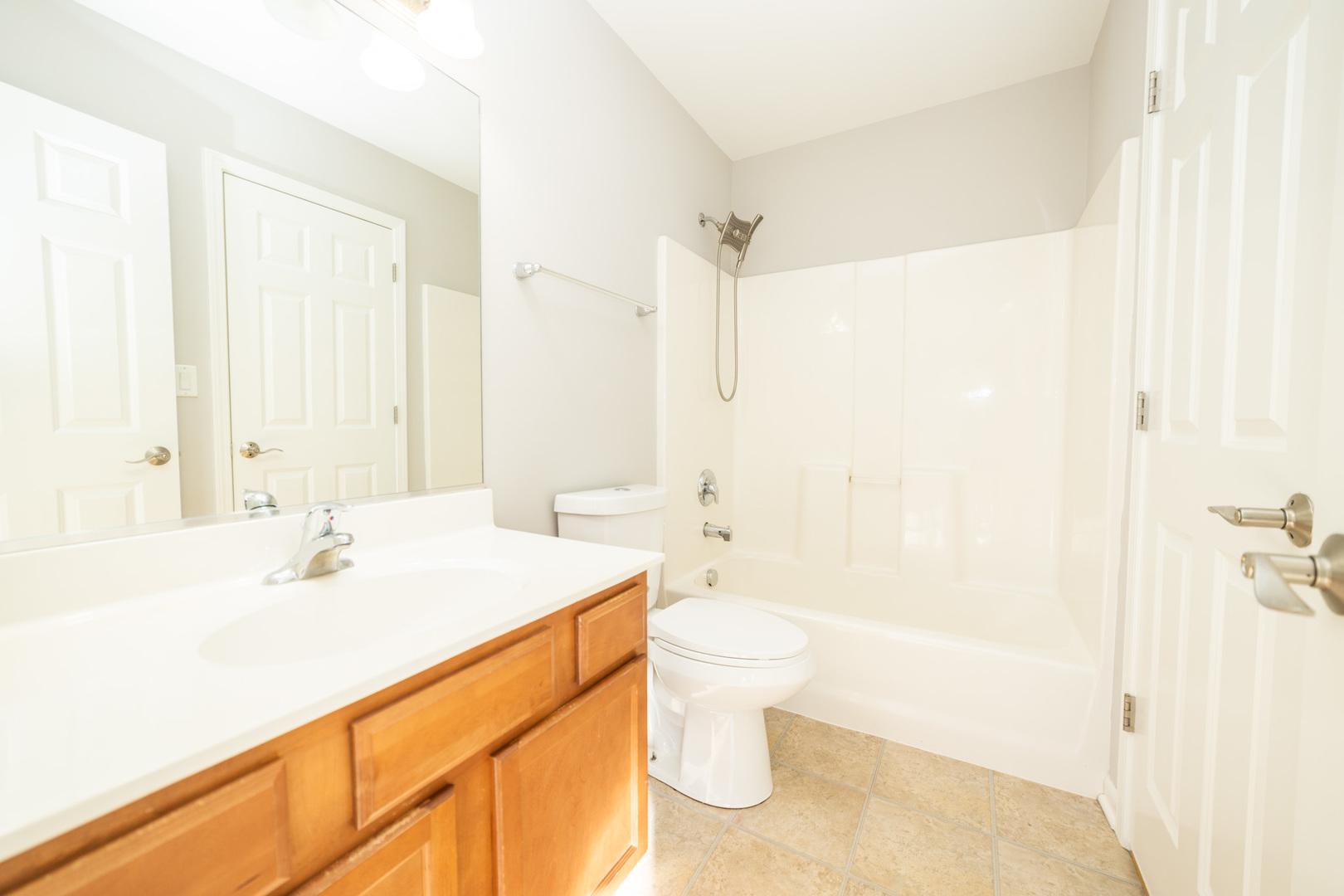 4313 Timber Ridge Court Joliet, IL 60431 - Photo 9 of 25 a bathroom with a sink toilet and shower