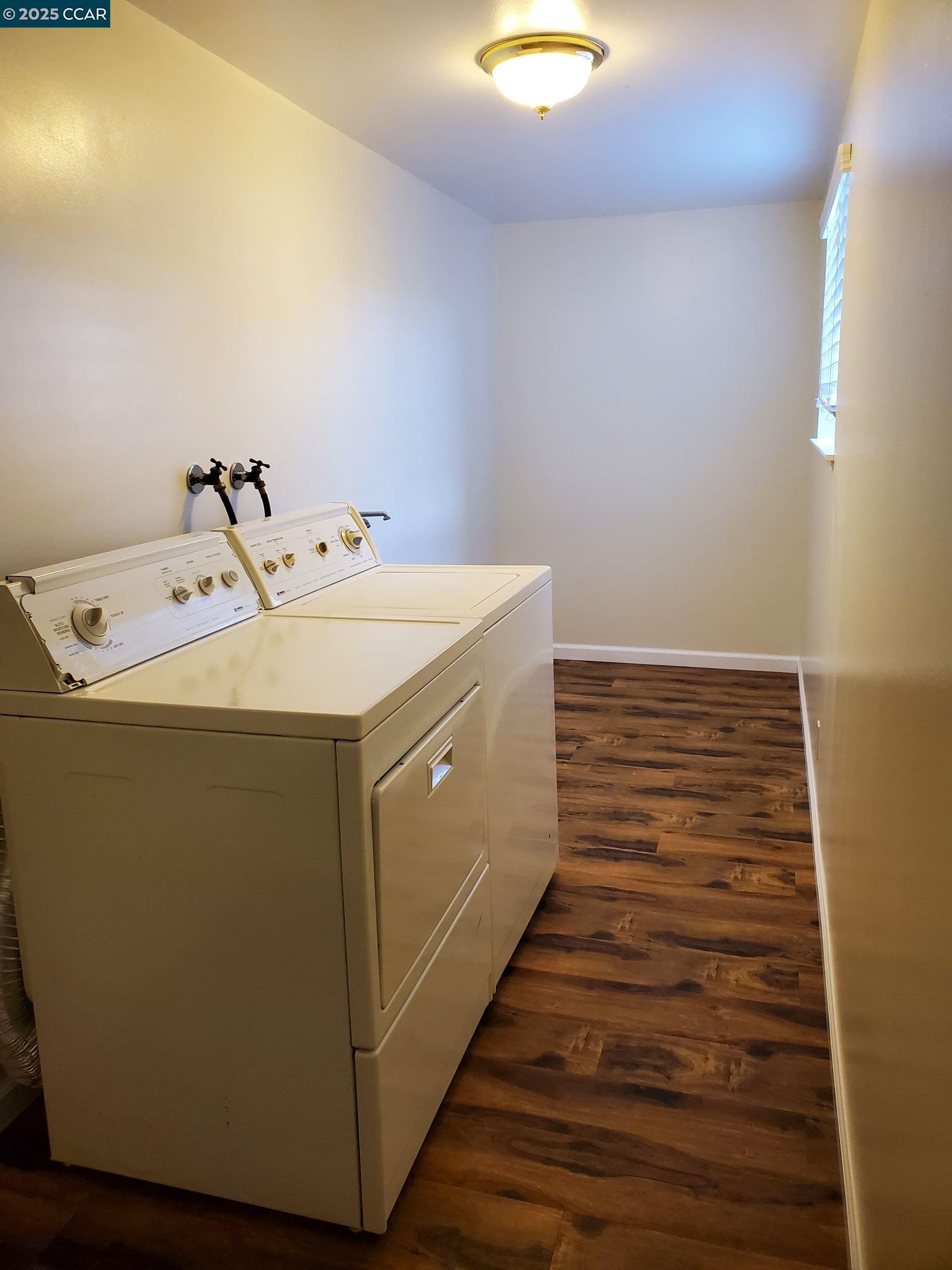 1616 Eve Drive Concord, CA 94521 - Photo 22 of 28 a utility room with washer and dryer