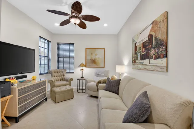 a very nice looking dining room with many windows