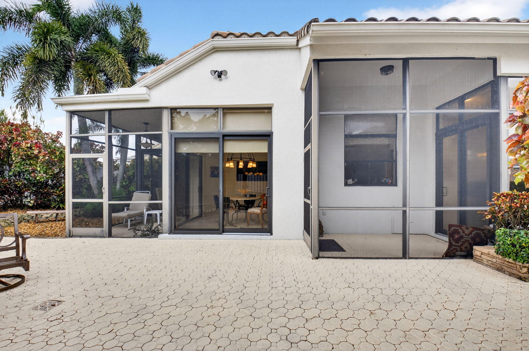 2462 Northwest 63rd Street Boca Raton, FL 33496 - Photo 25 of 41 a view of a house with outdoor space and porch
