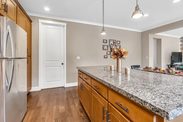 a utility room with sink dryer and washer
