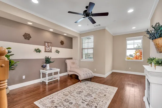 a bedroom with a bed and cabinets