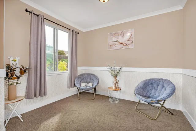 a white bath tub sitting in a bathroom